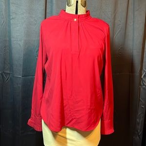 Burgundy top with ruffle detail